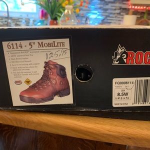 Mens size 8 1/2 Ricky steel toed boots. Brand new never worn still in box.